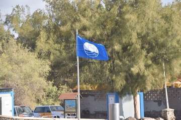 Izado de la bandera azul en Hoya del Pozo (foto TA/Francisco Javier Santana)